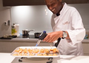 Blowtorching miso glazed prawns